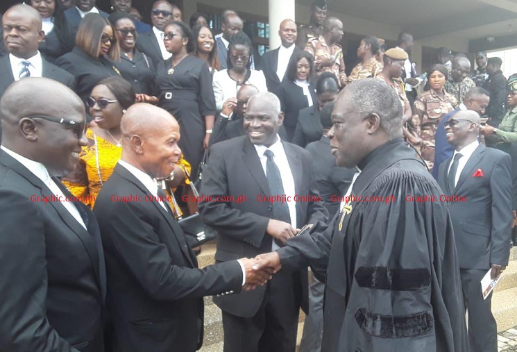 Rev. Dr Kwabena Opuni Frimpong (right) exchanging pleasantries with Justice Kofi Akrowiah, Ashanti Regional Supervising High Court Judge. Looking on is Kwame Owusu Sekyere, Ashanti GBA President