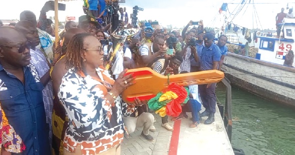 Hawa Koomson symbolically locking up the sea for the commencement of the closed season
