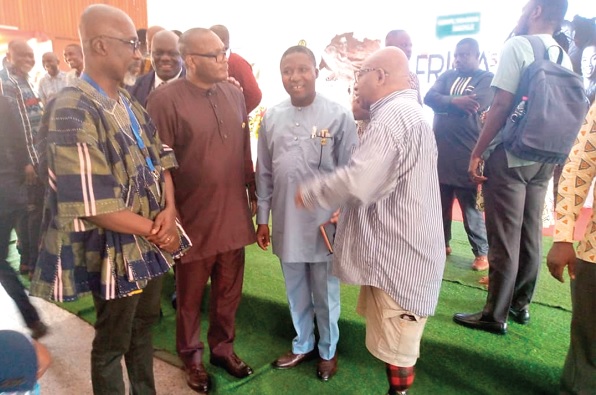 From left: Prof. Samuel Boakye Dampare, Kwamina E. Quaison and Prof. Paul Bosu interacting with Francis Allotey, son of the renowned Ghanaian scientist