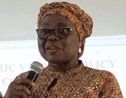 Justina Owusu-Banahene (inset), Bono Regional Minister, addressing the participants 