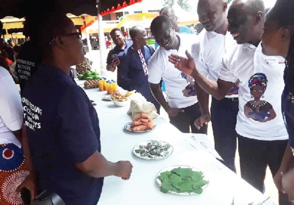 The dignitaries inspecting some of the products produced by the community members