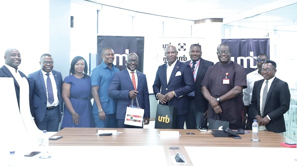Ato Afful (5th from right), MD, Graphic Communications Group Limited,  Nana Kwadwo Dwemoh Benneh (5th from left), Chief Executive Officer, UMB, with officials of UMB and GCGL after the meeting.  Pictures: EDNA SALVO-KOTEY