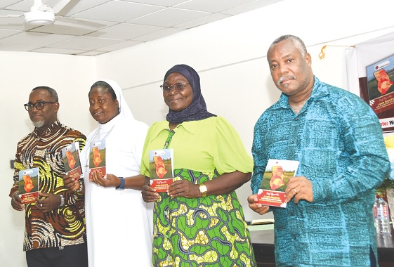 Sr Regina Aflah (2nd from left), Chairperson of CARITAS Ghana, with Dr Patrick Tandoh (left), Independent Consultant at GIMPA, Ayishetu Abdul-Kadri (2nd from right), Chairperson of Faith in Ghana Alliance, and Wilberforce Laate (right), Deputy Executive Director, CIKOD, jointly launching a report on land rights protocols and acquisition of land in four communities in Ghana. Picture: EBOW HANSON