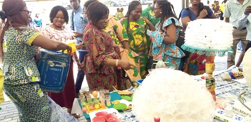  Some of the guests admiring some of the products from plastic waste
