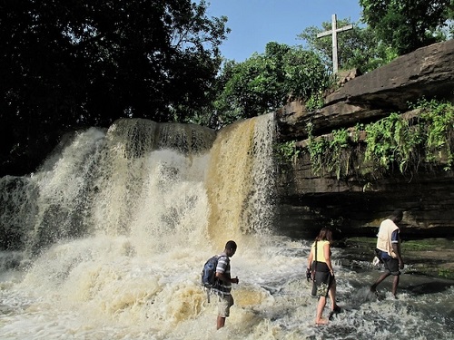  Some tourists having fun at the Fuller Falls. Picture: Greg Neate