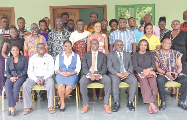 Kwesi Jonah (seated 2nd from left), Senior Research Fellow, Institute for Democratic Governance, with Douglas Quartey (seated middle), Researcher and Development Worker; Dela Ashiabor (seated right), Head, NPO Secretariat; Seth Nana Amoako (seated 3rd from right), Head of Compliance, Financial Intelligence Centre, and some participants after the workshop in Accra. Picture: ELVIS NII NOI DOWUONA