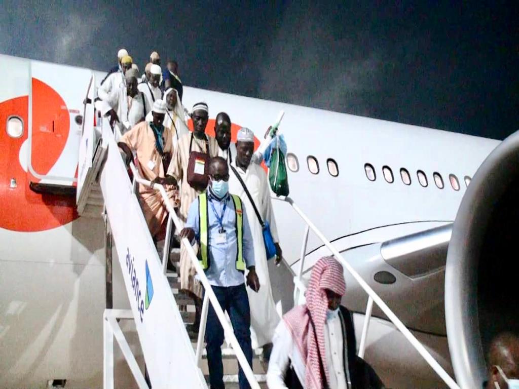 Some of the Pilgrims disembarking from the aircraft