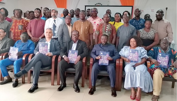  Kwame Gyimah Akwafo (4th from left), President of the Ghana Red Cross; Eric Nana Agyemang Prempeh (3rd from right), Director-General of NADMO, and Charlotte Norman (2nd from right), Coordinator of Climate Change at NADMO, with some participants after the launch of the report
