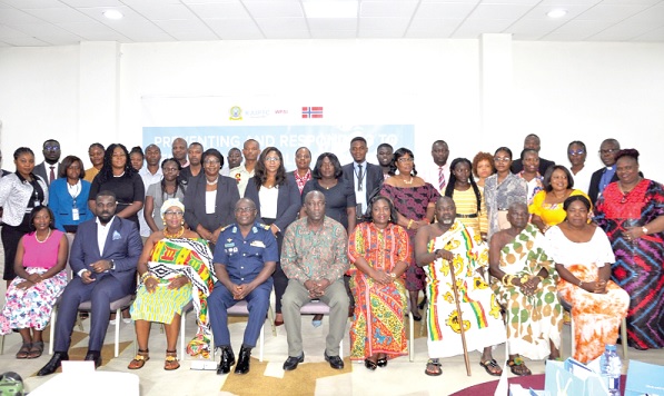 Dr Senanu Djokoto (seated, 2nd from left), the acting Regional Director of Health Service; Air Commodore George Arko-Dadzie (seated, 4th from left), the Deputy Commandant of the KAIPTC, and Augustus Awity (seated, middle), the Volta Regional Coordinating Director, and some of the participants