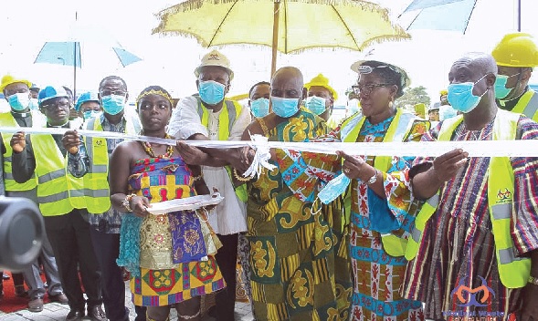 •Professor Oheneba Boakye Adjei (3rd from right), a representative of the Asantehene, being assisted by some dignitaries to innaugurate the treatment plant  
