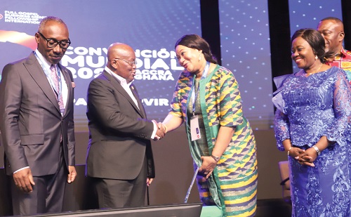 President Akufo-Addo (2nd from left) shaking hands with Jennifer Owusu (3rd from left), spouse of the International President of FGBMFI. Looking on are Gertrude Torkornoo (right), the Chief Justice, and Francis Owusu (left), International President of the FGBMFI. Picture: SAMUEL TEI ADANO