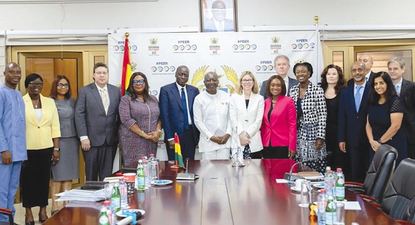 Ken Ofori-Atta (middle) and some officials of the Finance Ministry with the World Bank delegation led by Anna Bjerde (6th from right), World Bank Managing Director for Operations