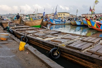 Saiko covered canoe used for transshipping semi-pelagic fish from Ghanaian flagged industrial trawlers 