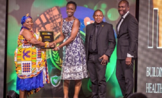 Grace Isaac Aryee (2nd from left), Treasurer, FBNBank Ghana, receiving the award from Nana Awo Ama Sakyibea, Ankobeahemaa, Akropong Aboasa. Looking on are Allen Quaye (2nd from right) and Enoch Vanderpuye (right), both executives of the bank