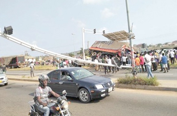 A traffic light knocked down by a vehicle at Ablekuma Pentecost Junction