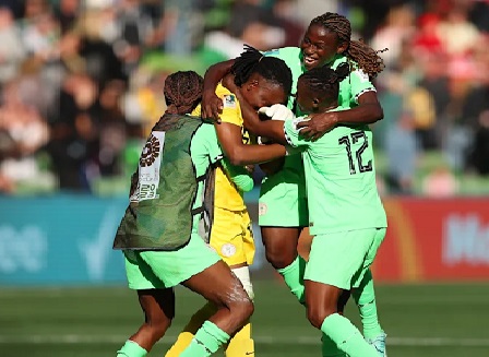 Chiamaka Nnadozie mobbed by her team mates after the match