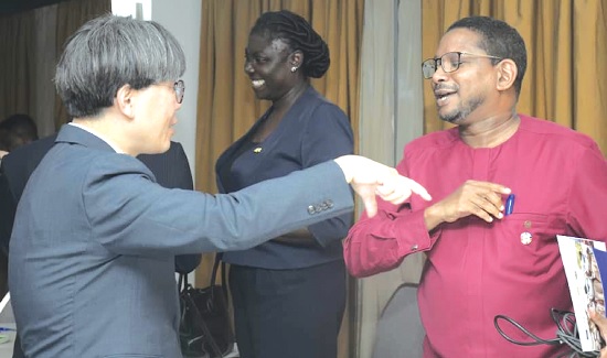 Abdourahamane Diallo (right), UNESCO Country Representative in Ghana, chating with Mr Woonghwan An, , Senior TVET Specialist, UNESCO Headquarters, Paris, after the programme. Picture: ALBERTA MORTTY