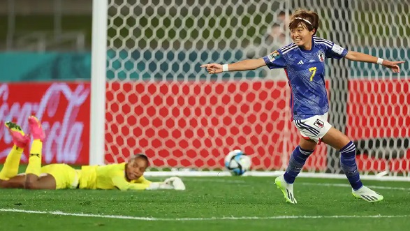 Hinata Miyazawa celebrates after beating Catherine Musonda in the Zambia goal. Photograph: Katelyn Mulcahy/Fifa/Getty Images