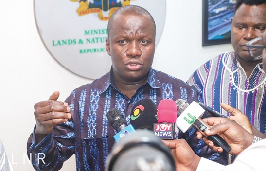 Samuel Abu Jinapor, Minister of Lands and Natural Resources, addressing journalists after receiving the report