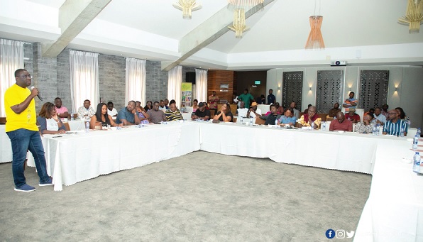 Sammy Awuku (left), Director General of NLA, speaking to some journalists at Peduase, near Aburi in the Eastern Region on the operations of the lottery and the new changes happening at the authority