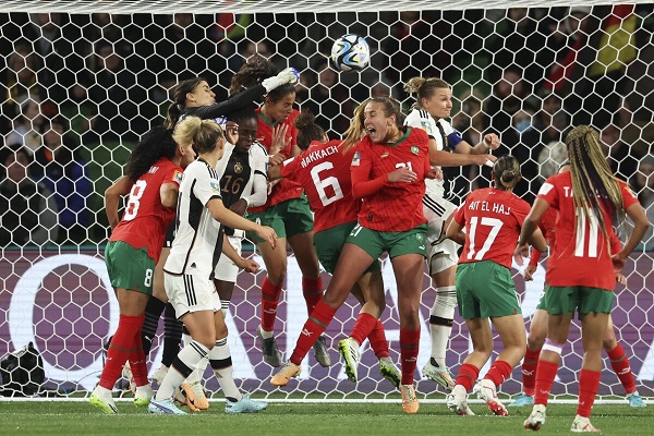 Morocco’s goalkeeper Khadija Er-Rmichi tries to punch the ball away as players collide in front of the Moroccan net, leading to an own goal