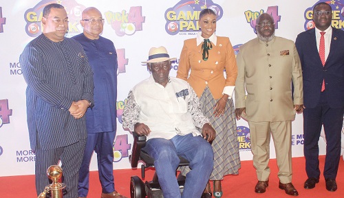 John Agyekum Kufuor (3rd from left), former President Ghana, with Bibi Bright (3rd from right), CEO, Game Park, Sammy Awuku (right), Director-General, NLA, and other dignitaries after the launch.Picture: ERNEST KODZI