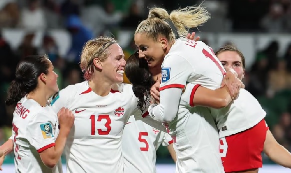 The Canadians celebrating their victory against the Republic of Ireland