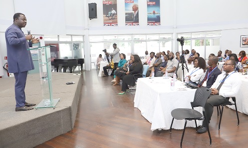 Rev. John Ntim Fordjour (left), a Deputy Minister of Education, addressing guests at the Mission Pediatrics Dyslexia meeting in Accra. Picture: SAMUEL TEI ADANO