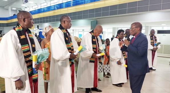 Rt. Rev. Dr Gordon Kisseih (right), General Overseer of Life International Church, speaking to the executive members of the Great Commission Church