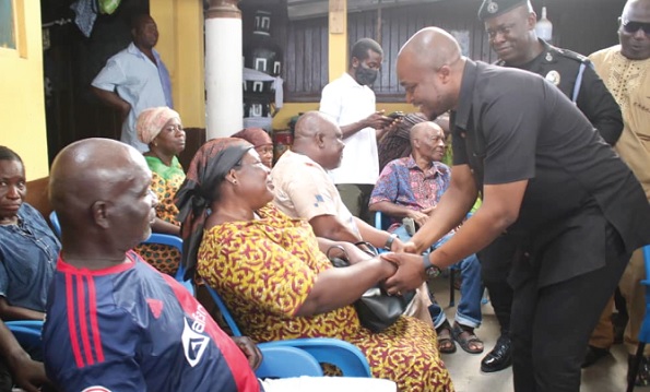 Yohane Nii Armah Ashitey (right), the Mayor of Tema, commiserating with some family members of the deceased. Picture: DELLA RUSSEL OCLOO