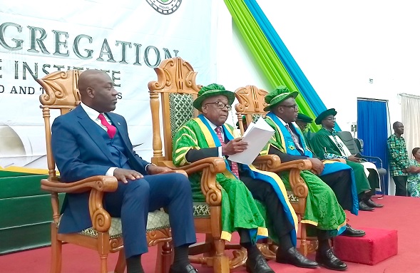 Kojo Oppong Nkrumah (left), Minister of Information, Kofi Darko Asante (2nd from left), Chairman of the GIMPA Governing Council and Prof. Samuel Kwaku Bonsu, Rector of GIMPA at the graduation ceremony. INSET: Some of the graduates 
