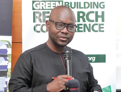 Francis Asenso-Boakye (left), Minister of Works and Housing, addressing participants in the Green Building Research Conference in Accra