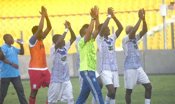 Players of RTU celebrating their big win over Hearts of Oak