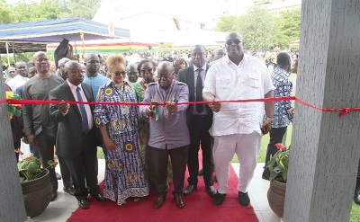 President Akufo-Addo (middle) being assisted by Kwaku Agyeman-Manu (2nd from left), Minister of Health, Henry Quartey (right), Greater Accra Regional Minister, to cut a ribbon to inaugurate the Department of Psychiatry Building at the Korle Bu Teaching Hospital in Accra. With them include Dr Opoku Ware Ampomah (2nd from right), CEO of Korle Bu Teaching Hospital, Prof. Nana Aba Appiah Amfoh, Vice Chancellor of the University of Ghana, and Prof. Angela Lamensdorf Ofori-Atta (3rd from left), Clinical Psychologist, University of Ghana Medical School 