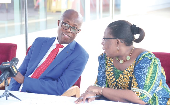Dr Emmanuel Srofenyoh (left) conferring with Charlotte Esi Myers at the function. Picture: Elvis Nii Noi Dowuona