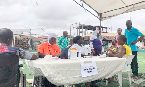 Some of the residents of Bukom going through the medical screening 
