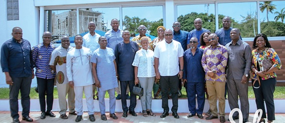 Former President John Mahama (arrowed) with the leadership of the Minority Caucus in Parliament, Julius Debrah (3rd from left), a former Chief of Staff; and some of the MPs