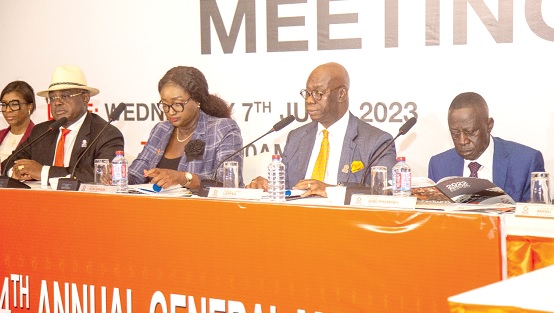 Reginald Daniel Laryea (2nd from right), Board Chair, GOIL PLC, addressing the AGM. With him are Kwame Osei-Prempeh (right), Group CEO and MD, GOIL PLC, Nana Ama Kusi-Appouh (2nd from left), Company Secretary, and Beauclerc Ato Williams, a Board Member. Picture: DOUGLAS ANANE-FRIMPONG