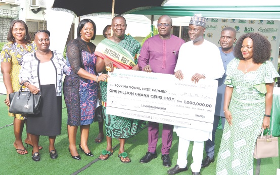 Dr Bryan Acheampong (3rd from right), Minister of Food and Agriculture, with Nana Yaw Siriboe (4th from right), 2022 National Best Farmer; Alhassan Yakubu-Tali (2nd from right), Managing Director, Agricultural Development Bank, Eno Ofori-Atta (right), Deputy Managing Director, and some dignitaries. Picture: ELVIS NII NOI DOWUONA