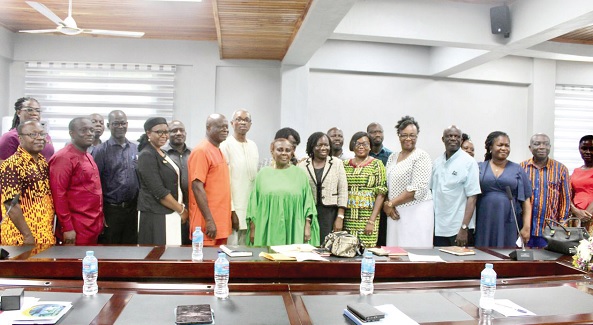 Cecilia Dapaah (arrowed), the Minister of Sanitation and Water Resources, with members of CONIWAS after the meeting