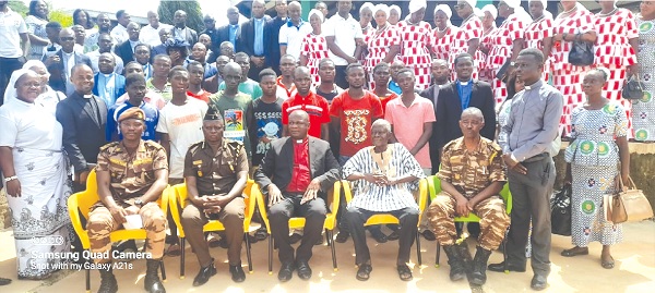 Prison officers, the clergy, some members of the Presbyterian Church and prisoners after the brief ceremony