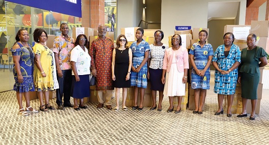 Godwin Avenorgbo (5th from left),  Group Director of Communications at Melcom, with representatives of the beneficary schools. With him is Sonya Sadhwani (6th from left), Executive Director, Melcom Group of Companies 