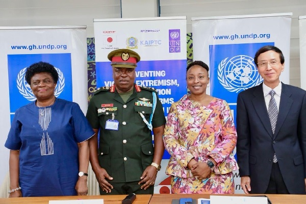 Mochizuki Hisanobu (right), Japanese Ambassador to Ghana; Dr Angela Lusigi (2nd from right), UNDP Resident Representative; Major General Addo Gyane (2nd from let), Commandant, KAIPTC, and Adelaide Anno-Kumi (left), Chief Director, Ministry of the Interior, at the launch