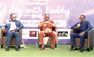  Dr Nathan Kwablah (right), Family Physician, Nyaho Medical Centre, addressing patrons at The Mirror’s “A Day with Daddy” celebration. Picture: ELVIS NII NOI DOWUONA