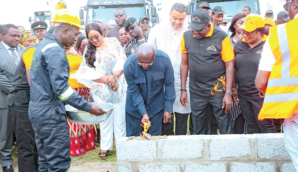 Vice-President Dr Mahamudu Bawumia laying  a brick as part of the sod-cutting ceremony
