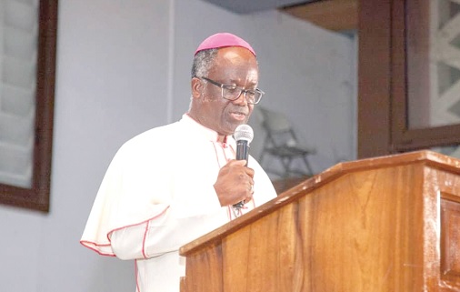 Most Rev. Emmanuel Kofi Fianu (left), Bishop of Ho, delivering the lecture