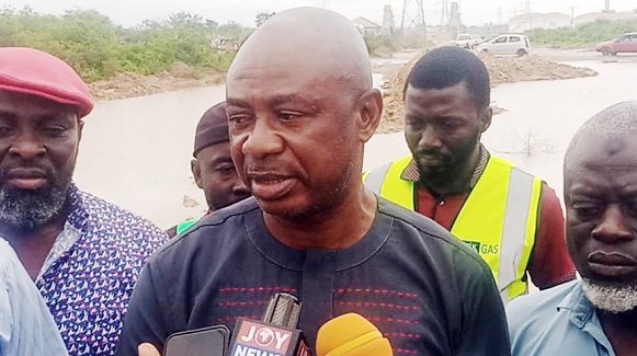 A section of the deteriorating Tema Oil Refinery to Kpone road. INSET: George Nyaunu, Chairman, the Ghana National Petroleum Tanker Drivers Union, addressing the media