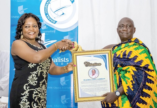 Beatrice Spio-Garbrah receiving her citation from Nana Boakye Yam Ababio, Nkwantakesehene
