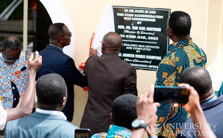 Dr Yaw Adutwum (INSET), Minister of Education, right, unveiling a plaque to inaugurate the centre