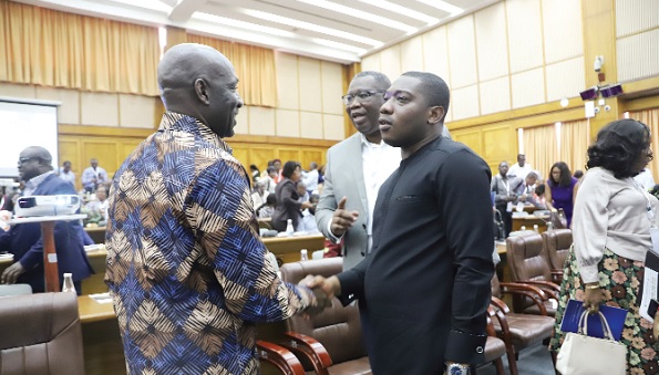 Herbert Krapa (right), Deputy Minister of Energy, in an interaction with Africanus Mensah (left), Chairman, Orsam Energies, after the conference. With them is Egbert Faibille Jnr (2nd from right), Chief Executive Officer, Petroleum Commission. Picture: EDNA SALVO-KOTEY